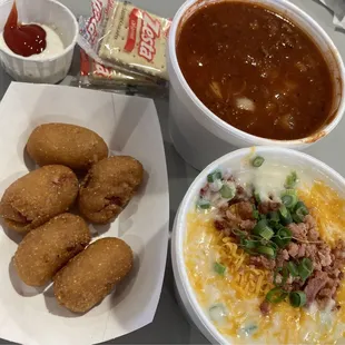 Chili with onions, loaded baked potato soup, and mini corndogs