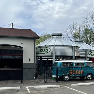 a van parked in front of a building