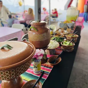 Mexican pottery for our salsa bar. We provide rice and beans