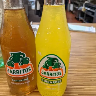 two bottles of orange juice