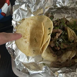 Missing meat from one taco.