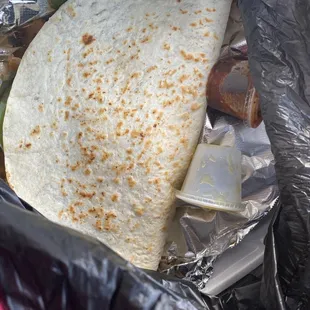 a tortilla wrapped in foil