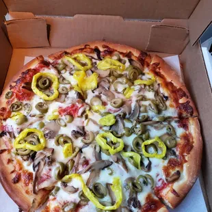 This is a small, extra sauce, extra well done pizza with mushrooms, green olives and banana peppers.  I forgot to ask for 2x banana peppers!