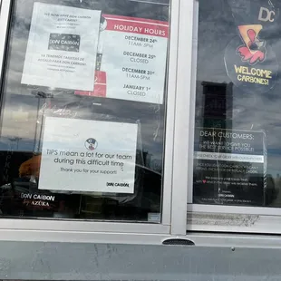a sign in a window of a business