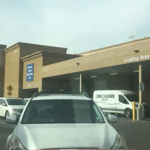 a car parked in front of a store