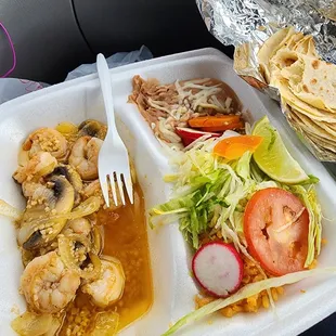 Camarones al mojo de ajo with rice , beans, tortillas