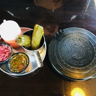 Salsas and tortillas before your meal comes out