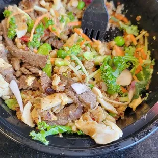 Half and half fitbowl which has kale, green peas, and quinoa