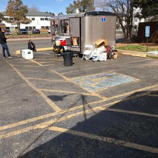 a food cart in a parking lot