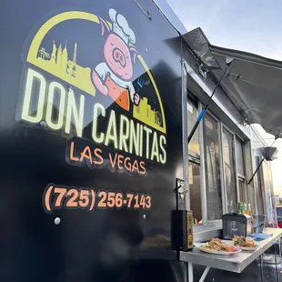 a food truck with a sign that says don carnitas las vegas