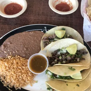 Regular sized tortillas for my asada and al pastor tacos! Really noice!!! And I wasn't even at Saltgrass like the plate says!