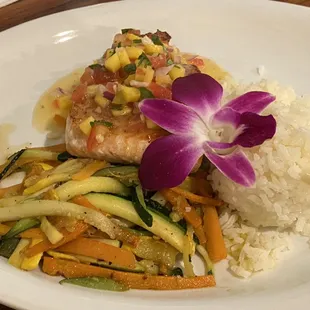 Salmon with ginger rice and veggies.