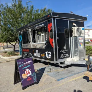 a food truck parked in a parking lot