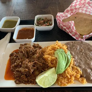 Barbacoa Platter with corn tortillas and hot and mild salsas.