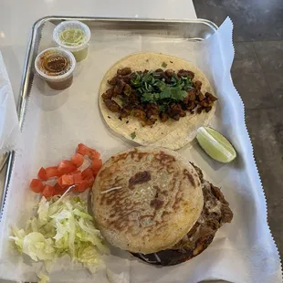 Carnitas gordita and Al Pastor tacos