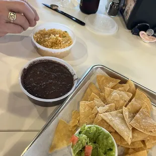 Amazing chips and fresh guac with a side of rice and beans!