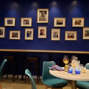 a dining room with blue walls