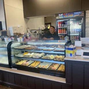 a woman behind the counter