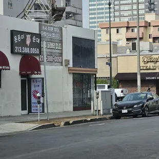 small restaurant off to side from the corner