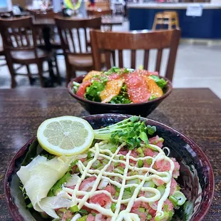 two bowls of food on a table