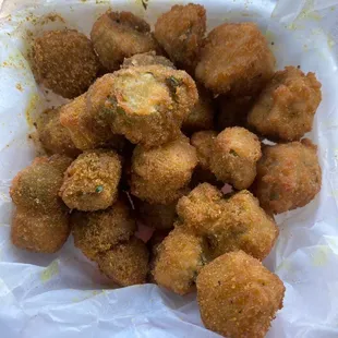 a basket of fried donuts