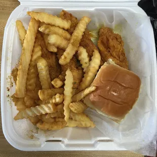 Wet seasoning 4 piece tenders with side of seasoned fries.