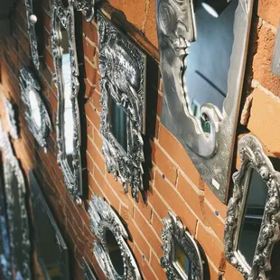 Staircase to our Pewter and Pottery Room, filled with Aluminum mirrors created by Don Drumm.