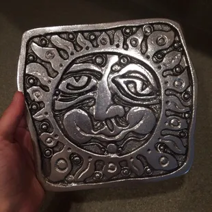 Cast aluminum cooking sculpture.