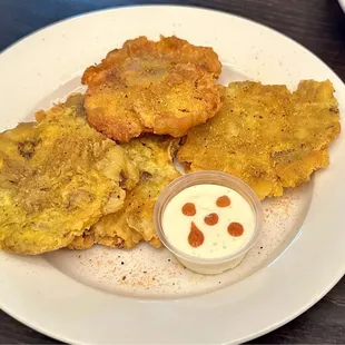 Tostones (Ask for extra sauce!!!!! It&apos;s sooo good!)