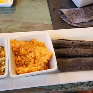 Blue corn pecan chicken flautas with corn salad and mex rice.