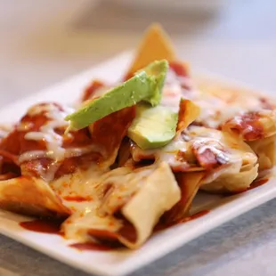 Chilaquiles in red chile