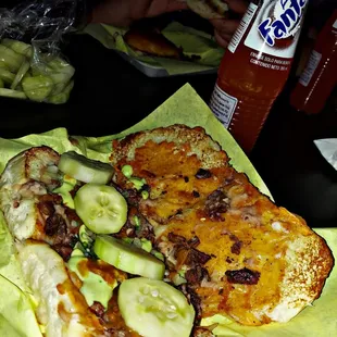 Carne Asada Torta with beans, cheese, and custom toppings from their salsa bar.
