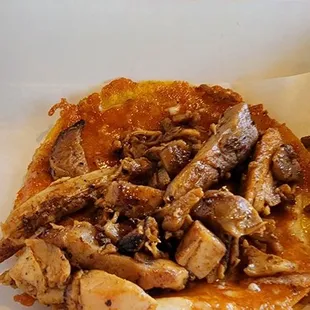 a close up of a chicken dish