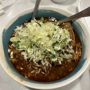 Pozole with cabbage and onions