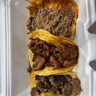 Carne asada, al pastor, and a birria queso taco