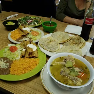 a table full of mexican food