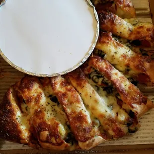 Aww yiss. This stromboli is killer. Must weigh 10 lbs! $13.95 for up to 3 toppings.