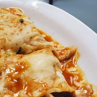 Hair sticking out of the the super burrito...