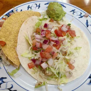 Shrimp taco with a crunchy tortilla and a fish taco with a soft tortilla