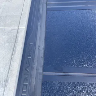 Photos of the scratches made on my new truck bed cover and rails.