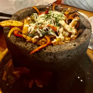 Molcajete very subpar and VERY extremely heavy on the Chipotle seasoning