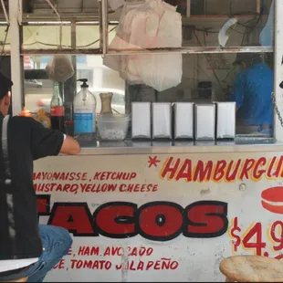 a man standing at the counter