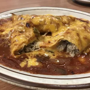 Chicken enchiladas got lots of shredded chicken inside