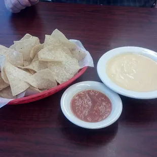 A very unique queso, homemade salsa, and chips. Yummy!