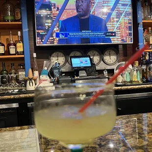 a television and a drink