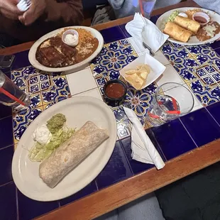 Mole Enchiladas (2), Chimis (2), and Super Burrito