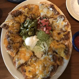 Nachos as good as we've ever eaten. We enjoyed their Guacamole. A full order was plenty for the two of us.  Very reasonable prices!