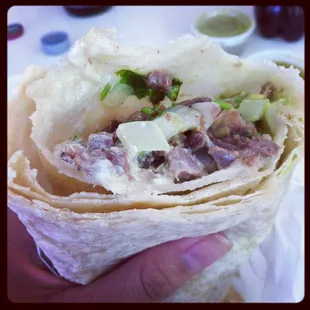 Lengua Burrito with guacamole and sour cream