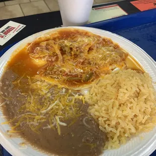 Huevos rancheros with beans and rice