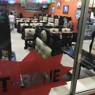 a store window with a stuffed animal in the window